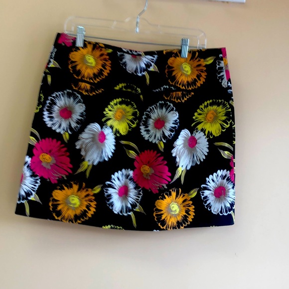 H&M Dresses & Skirts - Mini skirt black with the big flowers white orange pink size 12 from HOM